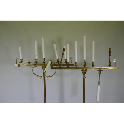 1127 - A Judaica pair of brass Menorah candlesticks, AF, 175cm high