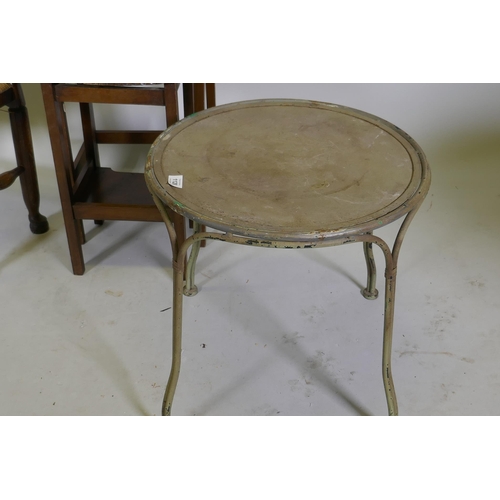 1128 - A painted metal occasional table, 45cm diameter x 45cm high, a rush seated stool and nest of two tab... 