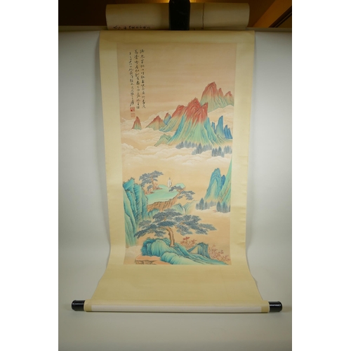 113 - A Chinese watercolour scroll depicting a figure in an extensive mountainous landscape, 49 x 98cm