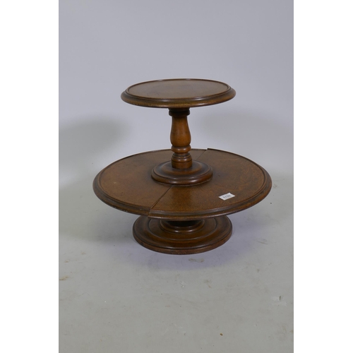 1133 - An antique oak two tier lazy susan, the lower tier revolving, 50cm diameter, 42cm high