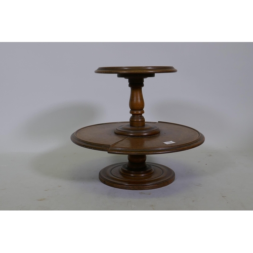 1133 - An antique oak two tier lazy susan, the lower tier revolving, 50cm diameter, 42cm high