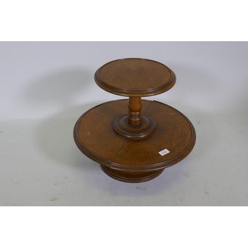 1133 - An antique oak two tier lazy susan, the lower tier revolving, 50cm diameter, 42cm high