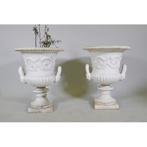 1137 - A pair of painted cast iron campagna garden urns, 47 dia x 60cm high