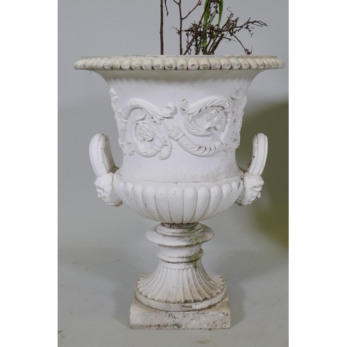 1137 - A pair of painted cast iron campagna garden urns, 47 dia x 60cm high