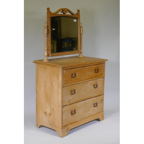 1156 - A Victorian stripped pine dressing table with swing mirror and three drawers, 81 x 46 x 17cm