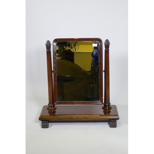 1170 - A C19th mahogany swing toilet mirror with tapering supports and original silvered glass, raised on p... 