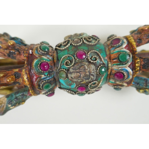 120 - A Tibetan cold painted bronze vajra with inset stone decoration, 23cm long