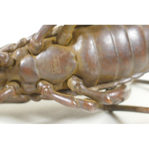 128 - A Japanese style bronze okimono grasshopper, 17cm long