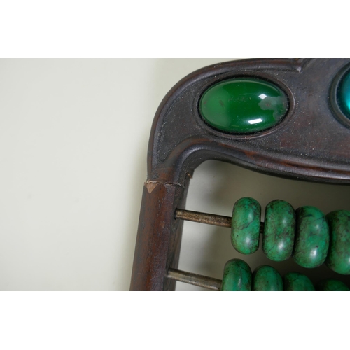 133 - A Chinese hardwood abacus with turquoise beads, 41 x 14cm