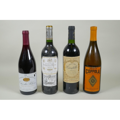 139 - Four bottles of wine to include a 1998 Domaine du Grand Tinel - Cotes du Rhone, a 2007 Marques de Ri... 