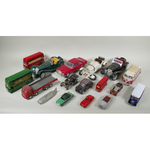 146 - A collection of diecast metal scale model cars including Burago, Matchbox, Dinky, Corgi etc, largest... 