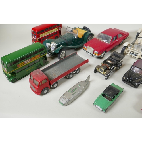 146 - A collection of diecast metal scale model cars including Burago, Matchbox, Dinky, Corgi etc, largest... 