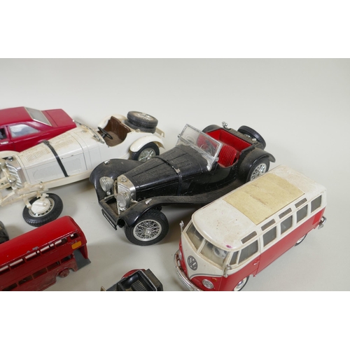 146 - A collection of diecast metal scale model cars including Burago, Matchbox, Dinky, Corgi etc, largest... 