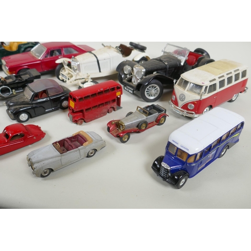 146 - A collection of diecast metal scale model cars including Burago, Matchbox, Dinky, Corgi etc, largest... 