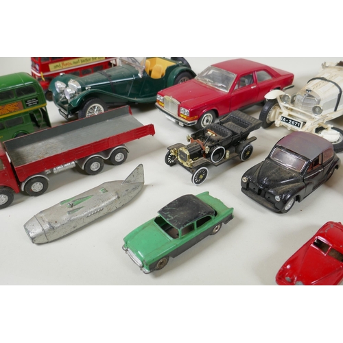 146 - A collection of diecast metal scale model cars including Burago, Matchbox, Dinky, Corgi etc, largest... 