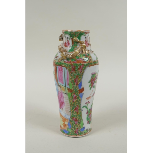 150 - A C19th Chinese Canton famille rose porcelain vase, with two gilt raised dragons and decorative pane... 