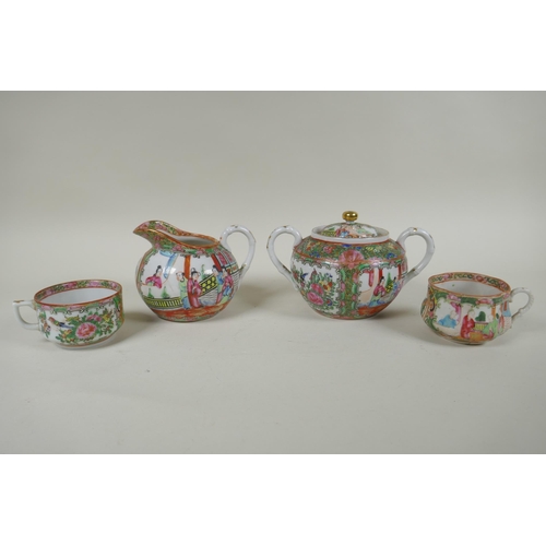 153 - A Chinese Republic Canton famille rose porcelain sugar pot, jug and two tea cups, largest 12cm diame... 