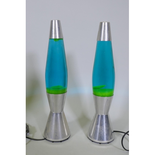 157 - A pair of Mathmos Astro baby lava lamps, 43cm high