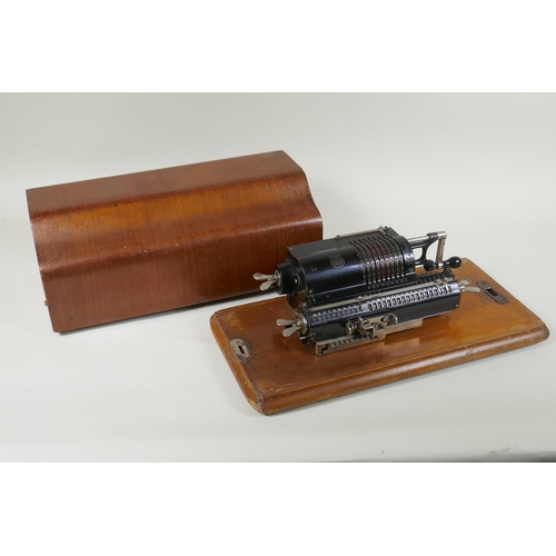 159 - An antique mahogany cased Trinks-Brunsviga mechanical calculator, 38 x 18cm x 16cm 