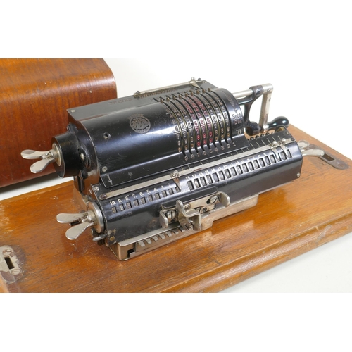 159 - An antique mahogany cased Trinks-Brunsviga mechanical calculator, 38 x 18cm x 16cm 