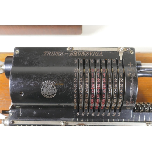 159 - An antique mahogany cased Trinks-Brunsviga mechanical calculator, 38 x 18cm x 16cm 