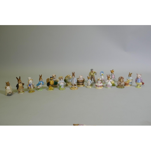 16 - A collection of vintage Beswick Beatrix Potter figurines, gold and brown back stamps including Foxy ... 