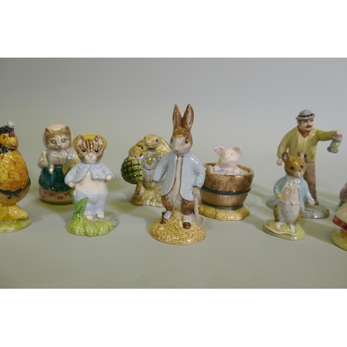 16 - A collection of vintage Beswick Beatrix Potter figurines, gold and brown back stamps including Foxy ... 