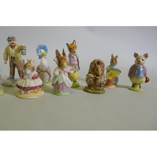 16 - A collection of vintage Beswick Beatrix Potter figurines, gold and brown back stamps including Foxy ... 