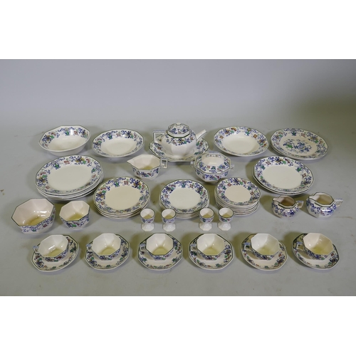 161 - A Doulton Burslem Nankin part dinner and tea service with various sized plates, saucers serving bowl... 