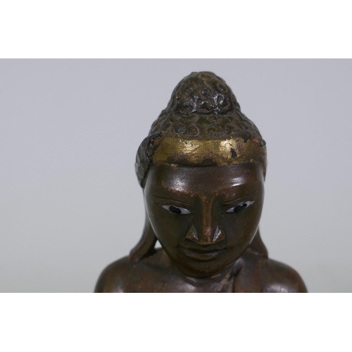 165 - Oriental bronze Buddha with inset glass eyes, possibly Burmese, 17cm high