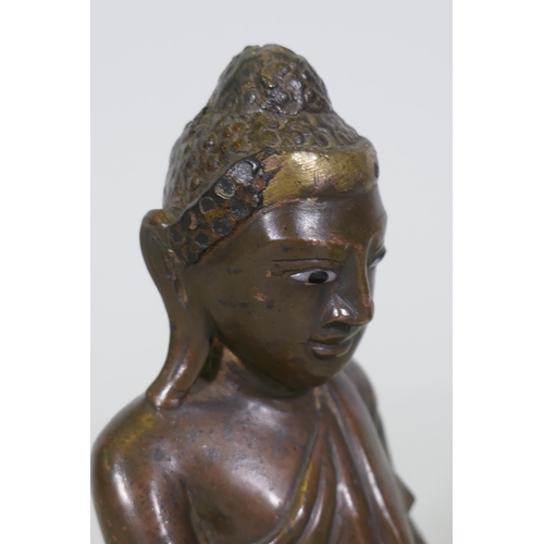 165 - Oriental bronze Buddha with inset glass eyes, possibly Burmese, 17cm high