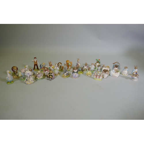 17 - A collection of Royal Albert Beatrix Potter figurines, 33 total