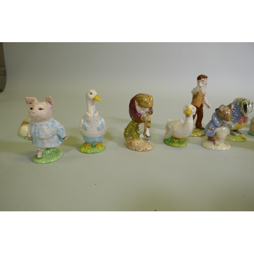 17 - A collection of Royal Albert Beatrix Potter figurines, 33 total