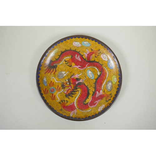 178 - A Chinese cloisonne dish decorated with a red dragon and flaming pearl, 20cm diameter