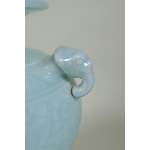 183 - A Chinese celadon glazed porcelain vase with two elephant mask handles and underglaze floral decorat... 