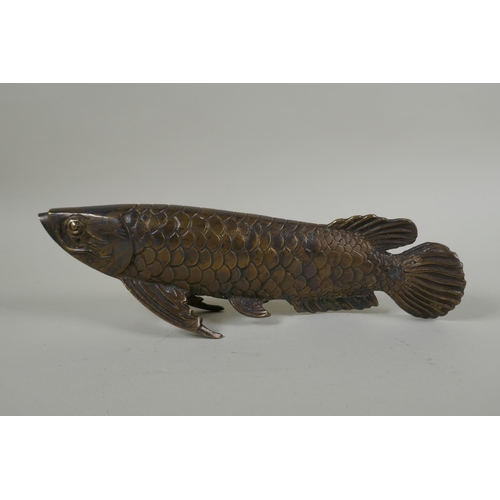 187 - A bronzed metal figure of a carp, 29cm long