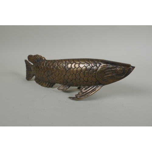 187 - A bronzed metal figure of a carp, 29cm long