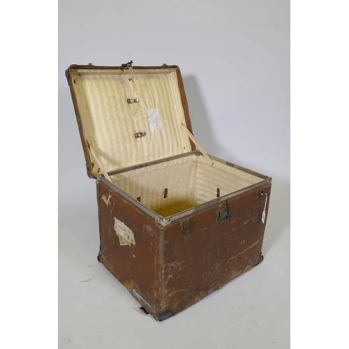 189 - A vintage canvas travel trunk with leather mounts, 52 x 42cm, 40cm high