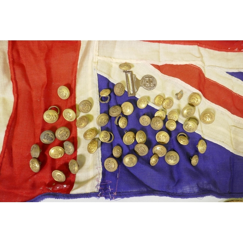 194 - Four vintage British Naval flags to include two Union Jacks, a white St George's cross ensign and a ... 