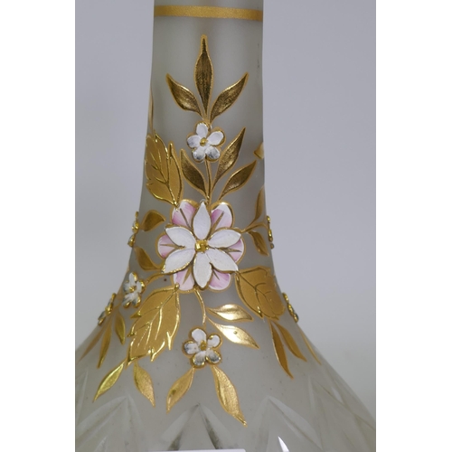 196 - A pair of cut and etched glass table lamps with gilt and enamel decoration, a brass bases, 67cm high