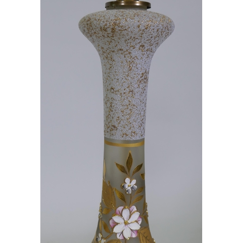 196 - A pair of cut and etched glass table lamps with gilt and enamel decoration, a brass bases, 67cm high