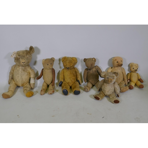 203 - A collection of antique plush teddy bears for repair, largest 67cm long