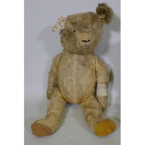 203 - A collection of antique plush teddy bears for repair, largest 67cm long