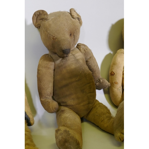 203 - A collection of antique plush teddy bears for repair, largest 67cm long