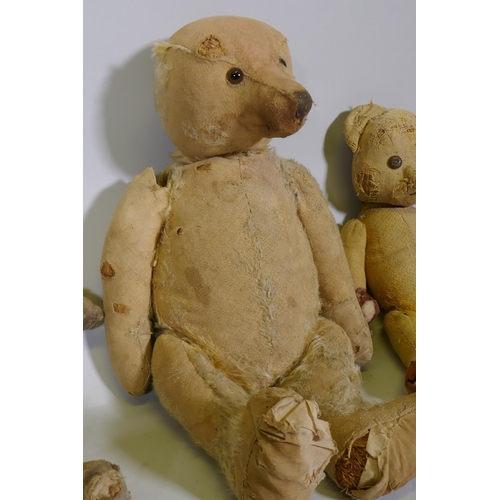 203 - A collection of antique plush teddy bears for repair, largest 67cm long