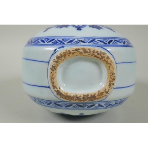 206 - A Chinese blue and white porcelain garlic head shaped flask with two handles and yin yang decoration... 