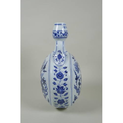 208 - A Chinese blue and white porcelain two handled moon flask decorated with a dragon and flaming pearl,... 