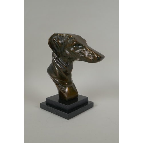 217 - A bronze greyhound bust, 22cm high