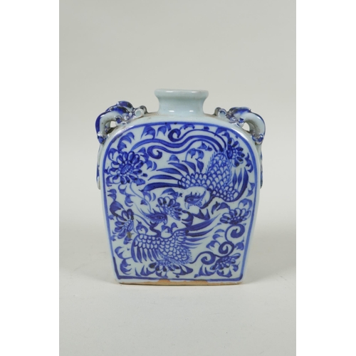 218 - A Chinese blue and white porcelain flask with four loop handles in the form of dragons, and decorate... 