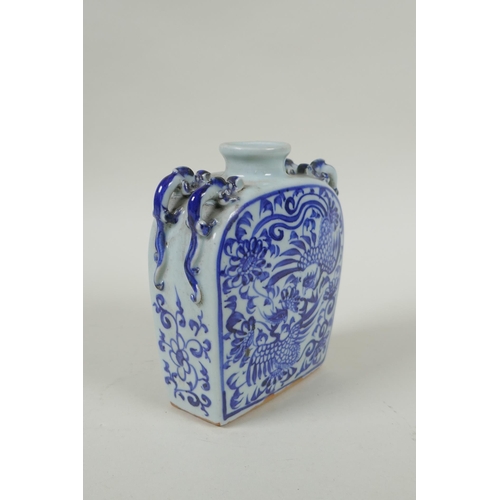 218 - A Chinese blue and white porcelain flask with four loop handles in the form of dragons, and decorate... 